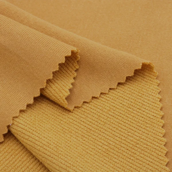 Polyester french terry fabric in mustard yellow color FS047
