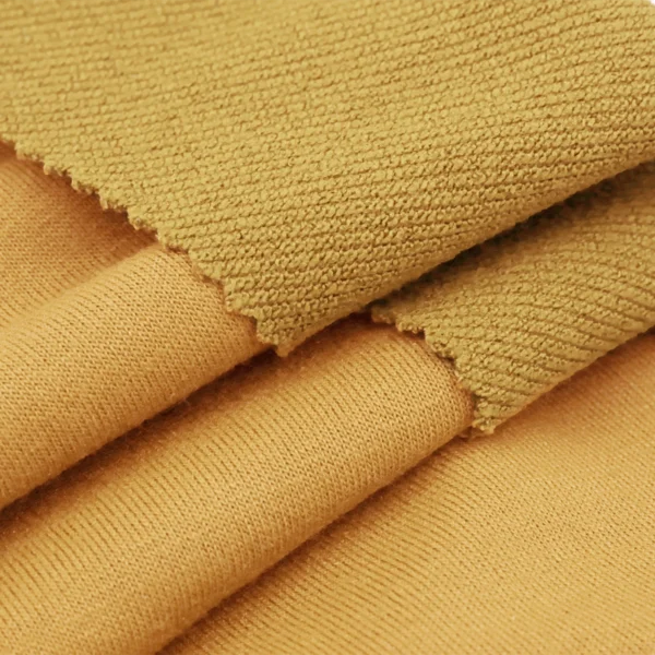 Polyester french terry fabric in mustard yellow color FS047