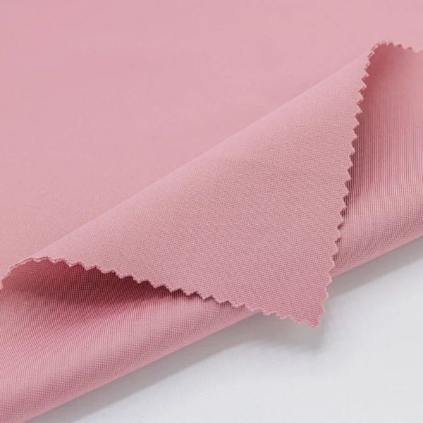 Polyester Double Knit Spandex fabric in nude pink color GDD376