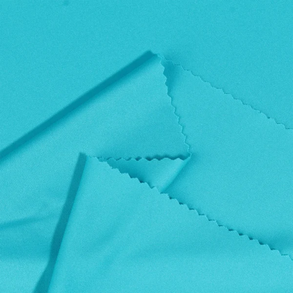 Polyester interlock fabric in turquoise blue color I336