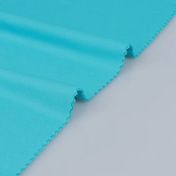 Polyester interlock fabric in turquoise blue color I336