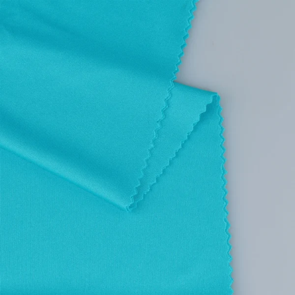 Polyester interlock fabric in turquoise blue color I336