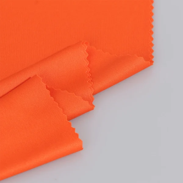 Polyester interlock fabric in orange color I380