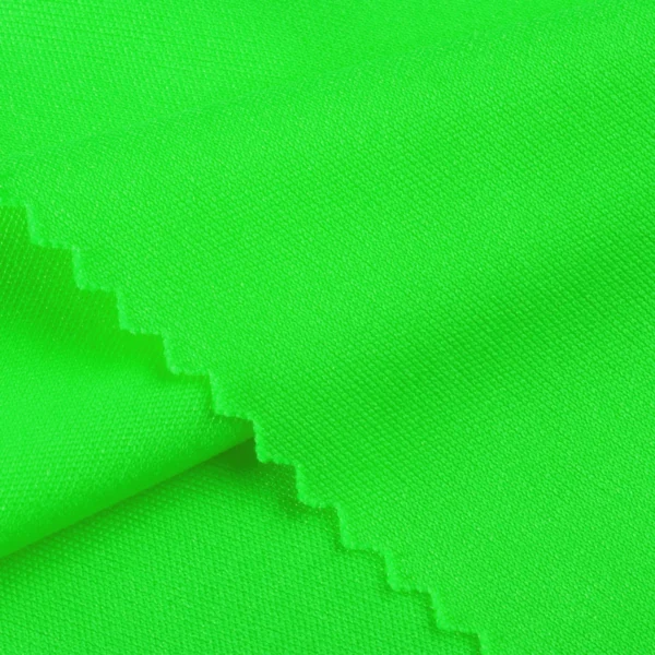 Polyester interlock fabric in neon green color I403