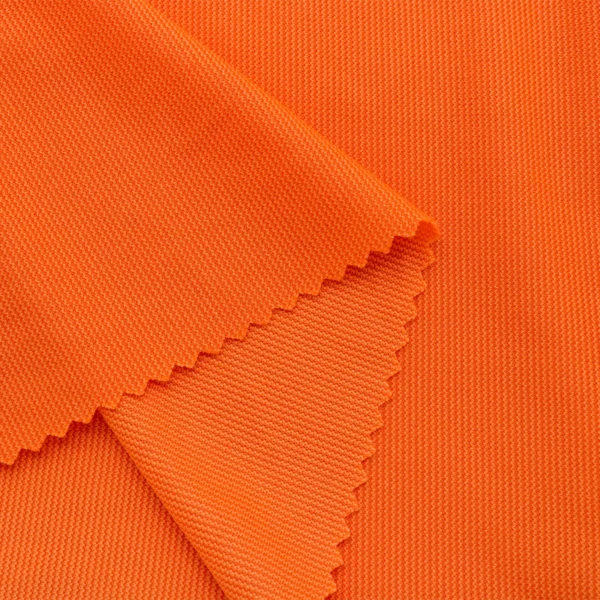 Polyester interlock fabric in Orange I536