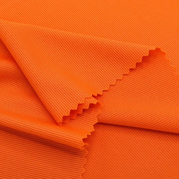 Polyester interlock fabric in orange color I537