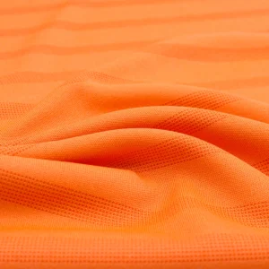 Polyester interlock jacquard fabric in orange color I540