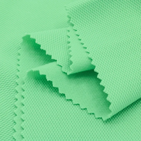 Polyester close hole mesh fabric in light green MD750