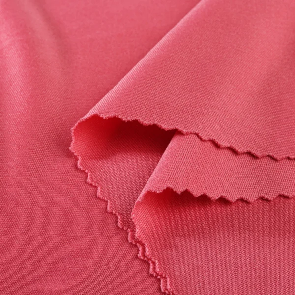 Polyester Interlock fabric in rose pink QI362