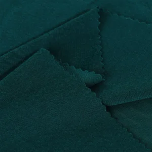Polyester single jersey fabric in dark green color S586