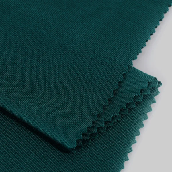 Polyester single jersey fabric in dark green color S586