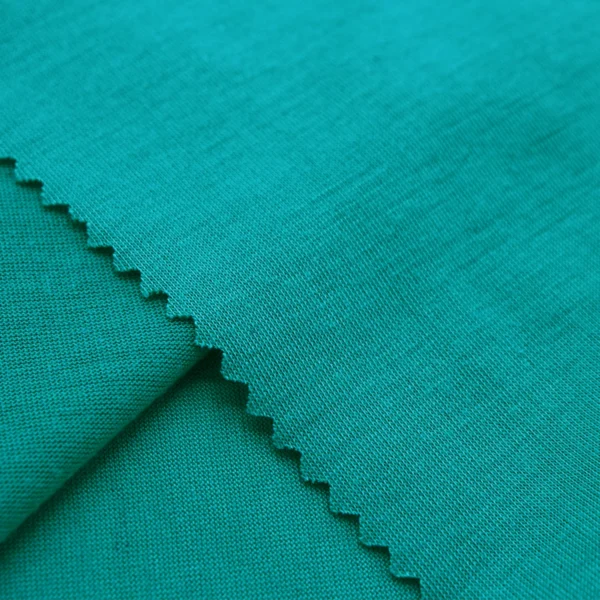 Polyester single jersey fabric in green color S586-O9340