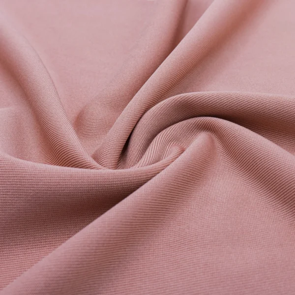 Polyester single jersey fabric in nude pink color S642