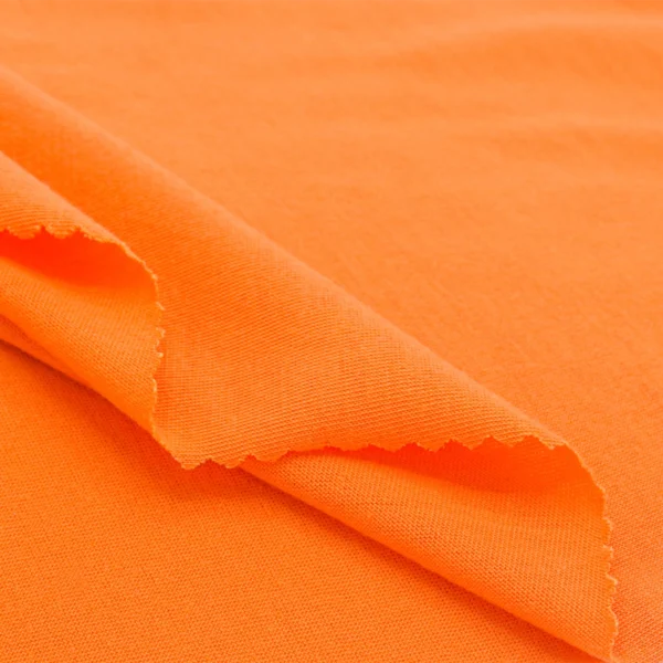 Polyester single jersey fabric in orange color S677