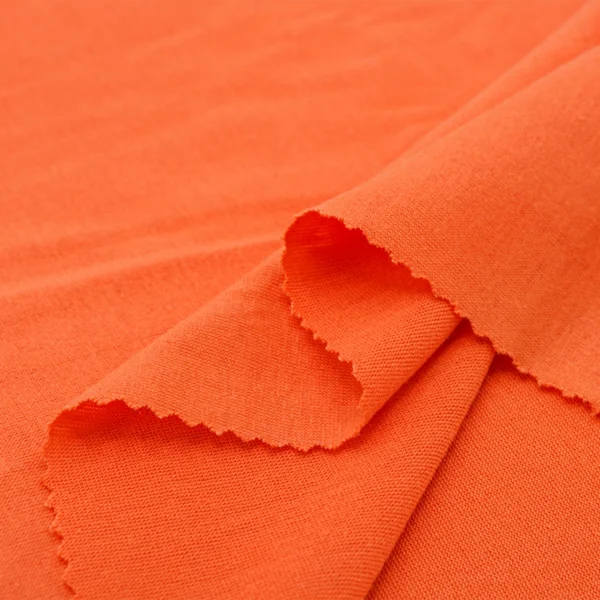 Polyester single jersey fabric in orange color S715