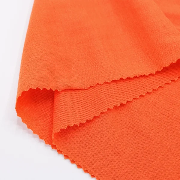 Polyester single jersey fabric in orange color S715