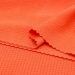 Polyester hexagon knit mesh fabric in orange QMD899