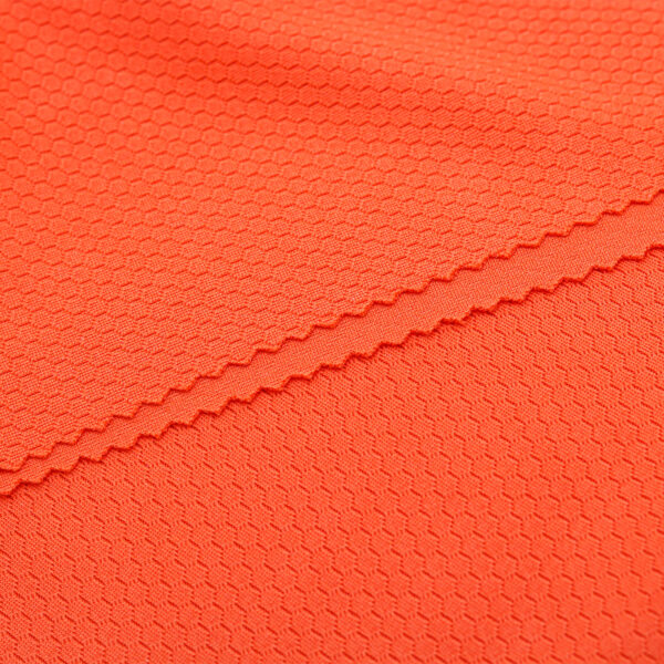 Polyester hexagon knit mesh fabric in orange QMD899
