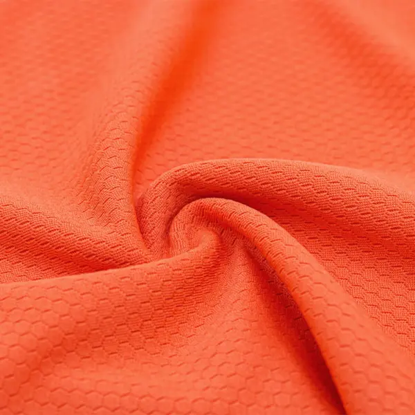 Polyester hexagon knit mesh fabric in orange QMD899