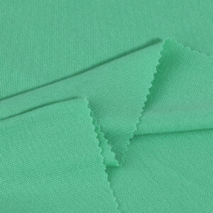 ผ้าโพลีเอสเตอร์ ผ้าจูติทีเค สีเขียวอ่อน P237-PC7322