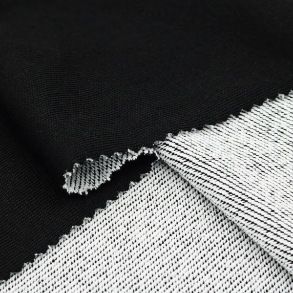 ผ้าโพลีเอสเตอร์ ผ้าเกล็ดปลา สีดำขาว FD007