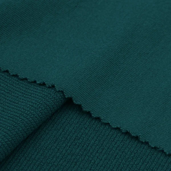 ผ้าโพลีเอสเตอร์ ผ้าเกล็ดปลาทีเค สีเขียว FS047