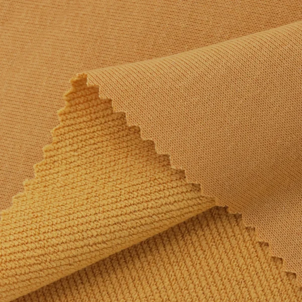 ผ้าโพลีเอสเตอร์ ผ้าเกล็ดปลาทีเค สีเหลือง FS047