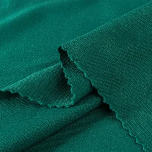 ผ้าโพลีเอสเตอร์ ผ้าอินเตอร์ล็อค ผ้าเรียบ สีเขียวเข้ม I306