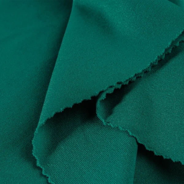 ผ้าโพลีเอสเตอร์ ผ้าอินเตอร์ล็อค ผ้าเรียบ สีเขียวเข้ม I306