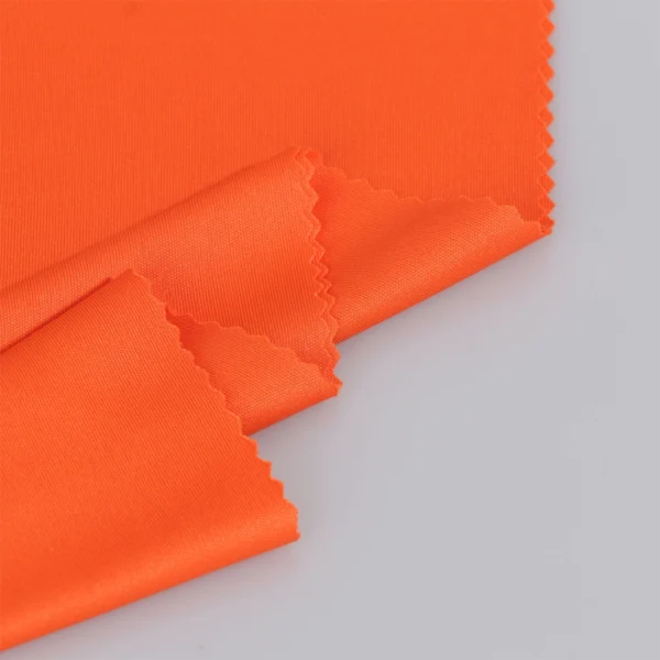 ผ้าโพลีเอสเตอร์ ผ้าอินเตอร์ล็อค ผ้าเรียบไมโคร สีส้ม I380