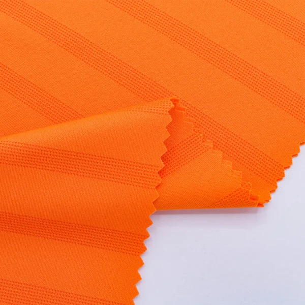 ผ้าโพลีเอสเตอร์ ผ้าแจ็คการ์ดอินเตอร์ล็อค ผ้าเรียบไมโคร สีส้มลายทาง I540