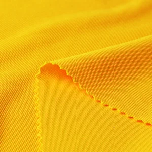 ผ้าโพลีเอสเตอร์ ผ้าจูติ ผ้าปิเก้ สีเหลือง P335