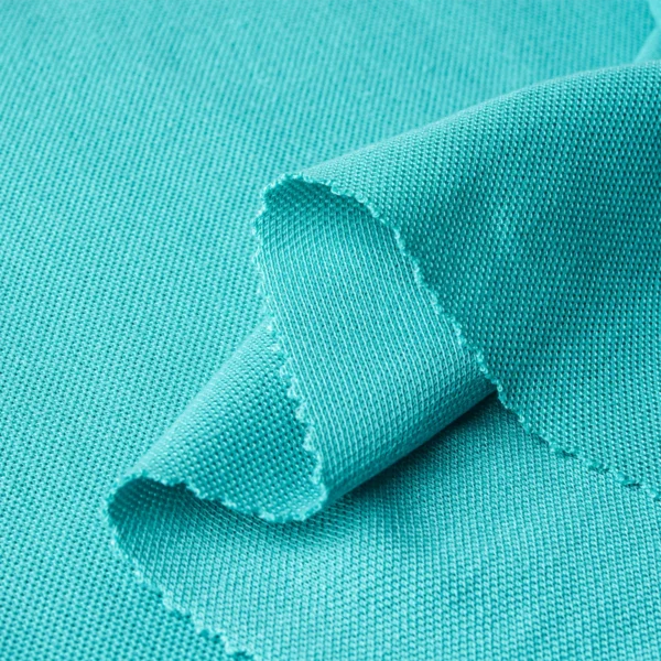 ผ้าโพลีเอสเตอร์ ผ้าจูติทีเค ผ้าปิเก้ สีเขียว P76-P7320