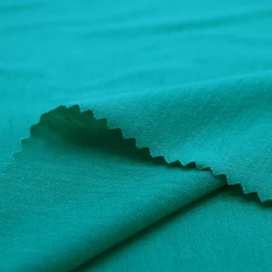 ผ้าโพลีเอสเตอร์ ผ้าทีเค ผ้าซิงเกิลเจอร์ซีย์ สีเขียว S586-O9340