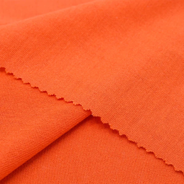 ผ้าโพลีเอสเตอร์ ผ้าทีเค ผ้าซิงเกิลเจอร์ซีย์ สีส้ม S715