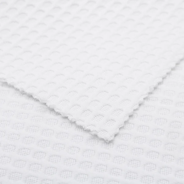 ผ้าโพลีเอสเตอร์ ผ้าอินเลย์ สีขาว ลายวาฟเฟิล PL020-54