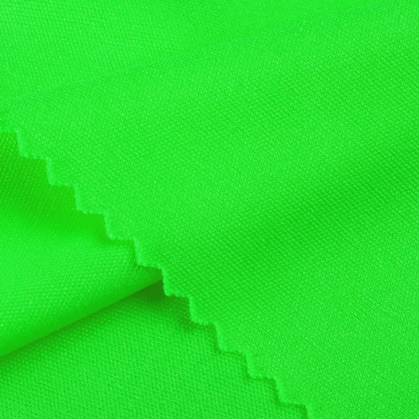 ผ้าโพลีเอสเตอร์ ผ้าอินเตอร์ล็อค ผ้าเรียบไมโคร สีเขียวสะท้อนแสง I403