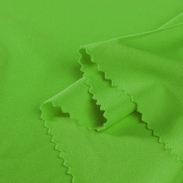 ผ้าโพลีเอสเตอร์ ผ้าอินเตอร์ล็อค ผ้าเรียบไมโคร สีเขียวตอง I465